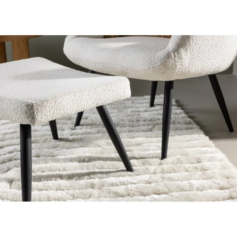 Como fåtölj i vit boucle