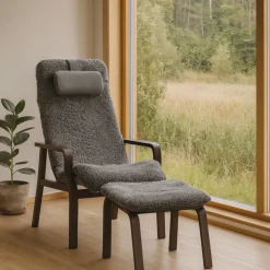 Fårskinnsfåtölj med fotpall - Frank + Möbeltassar