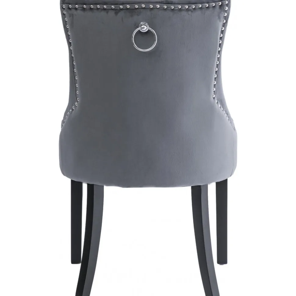Matstol i grå sammet med svarta ben