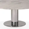 Next runt soffbord i marmor med fot i borstat stål