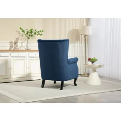 Öronlappsfåtölj i blått sammet